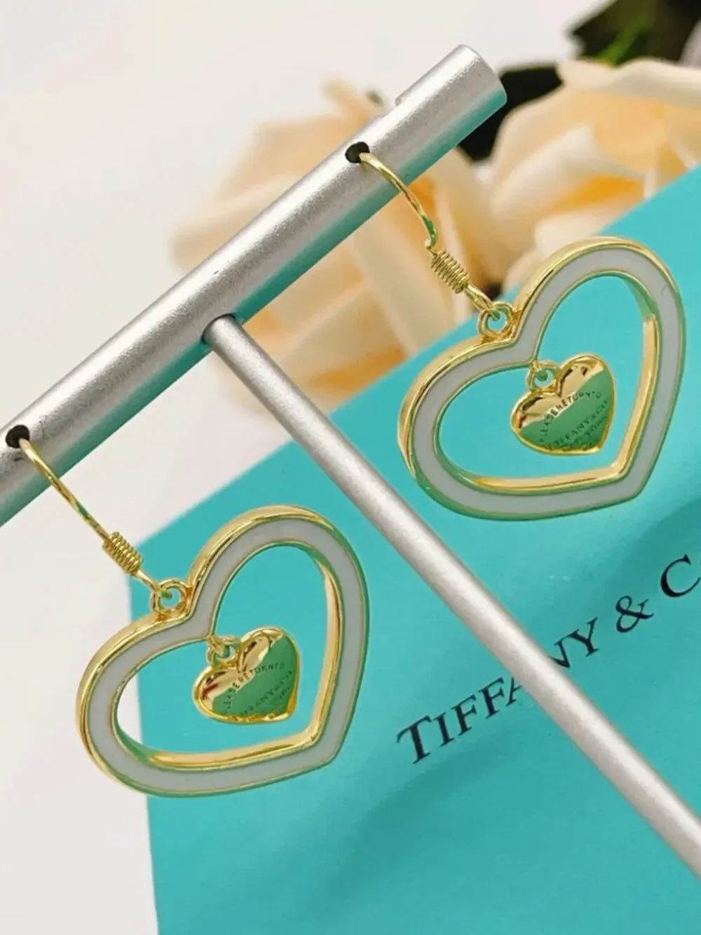 Tiffany & Co. Gold Tassel White Heart Earrings
